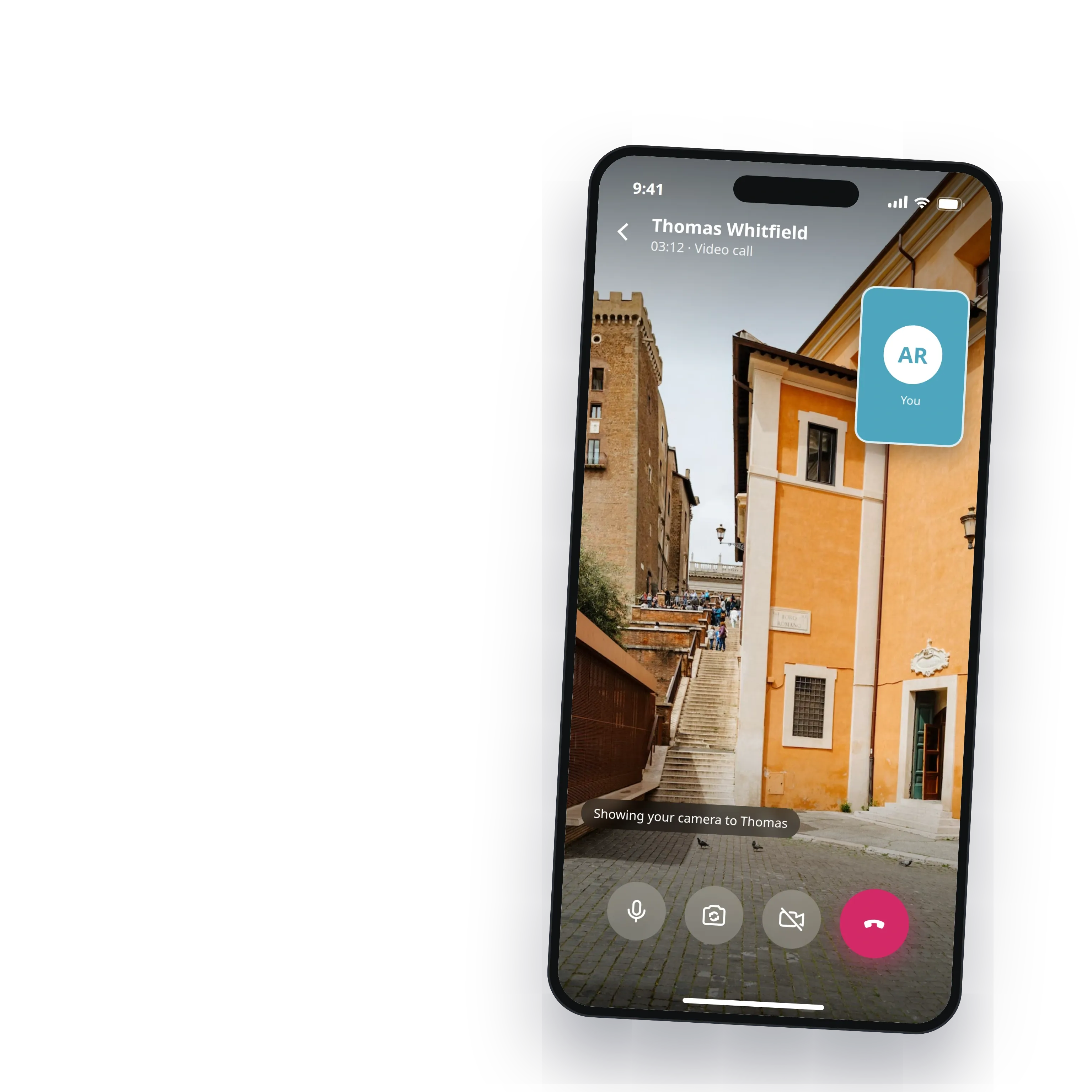 A video call in the final theme, the traveller showing the street to the helper, with a self view and call controls